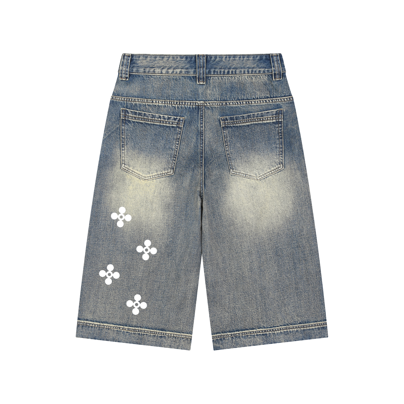 Blue denim shorts with white floral patterns on a white background